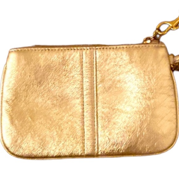Coach Handbags - Coach Metallic Gold Wristlet Wallet